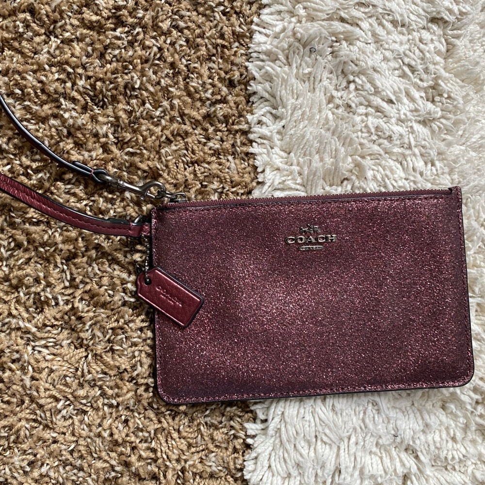 purple coach wristlet